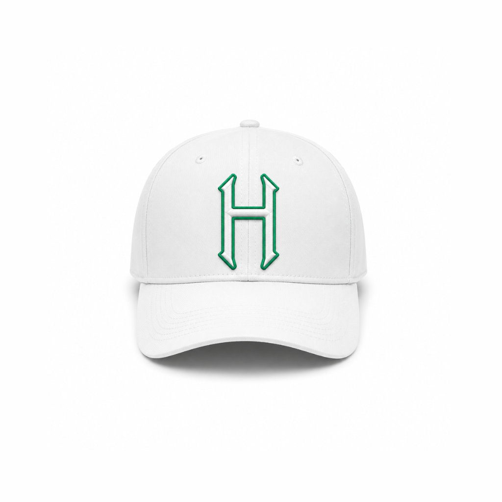 White baseball cap with embroidered green H patch on front panel